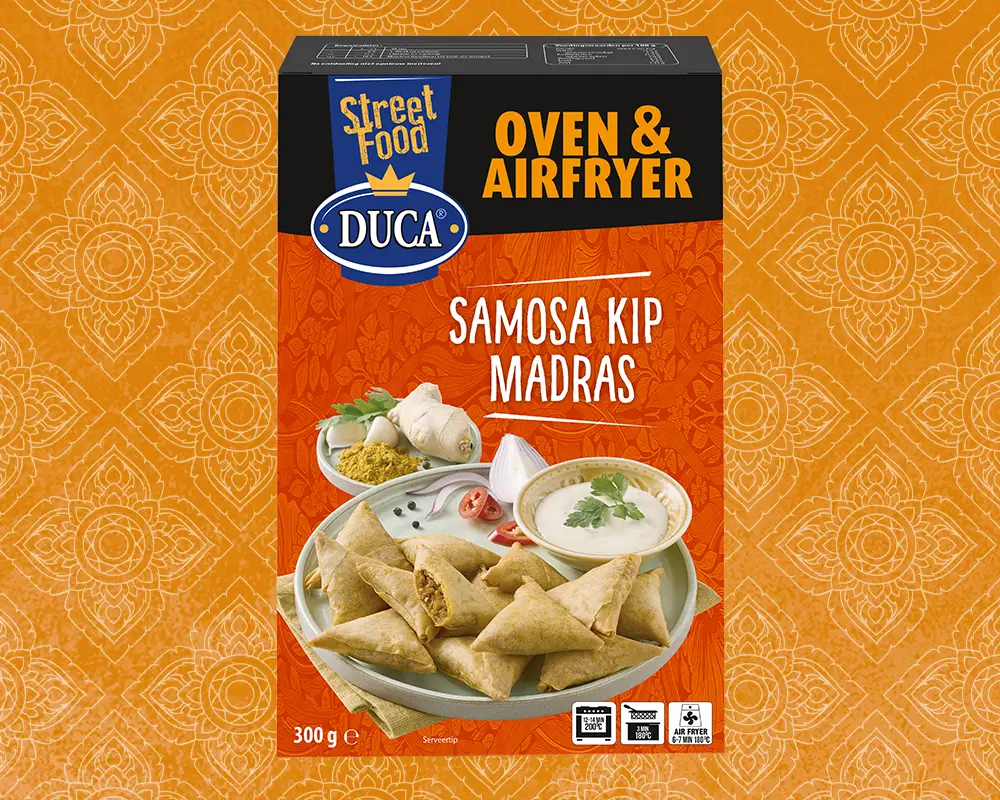 Our chicken madras samosa is a crispy, triangle-shaped snack packed with flavour. Filled with spiced chicken, vegetables like carrot and onion, and seasoned with Madras curry spices for that extra kick.