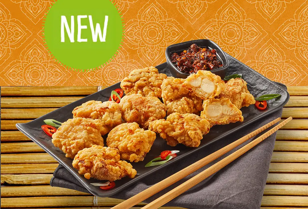 The tatsuta style is a traditional Japanese method where the chicken pieces are first marinated in a mixture of soy sauce, mirin, sake, and ginger before being breaded.